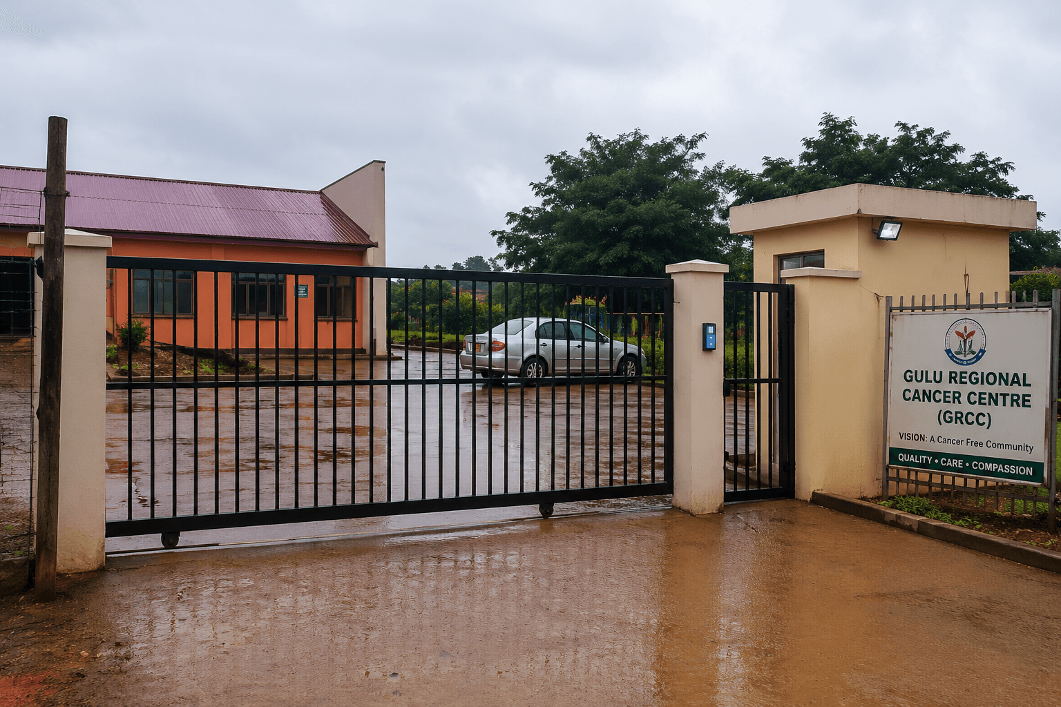 Entrance gate and official signboard at Gulu Regional Cancer Centre during Cybernet intercom and communication matrix installation